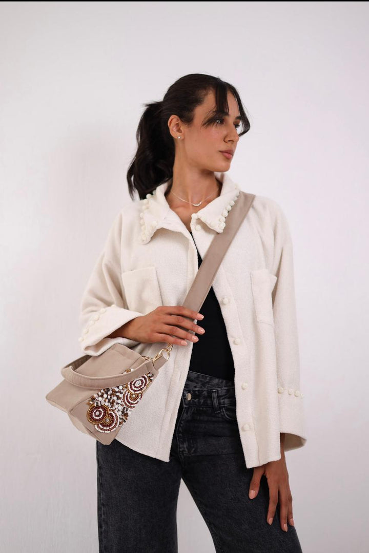 Greyish embroidered bag