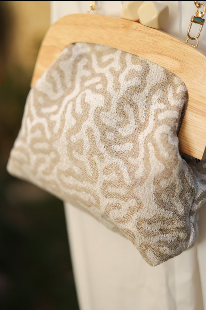 Coral wooden frame clutch