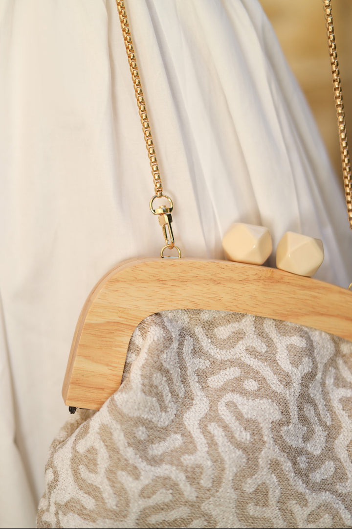 Coral wooden frame clutch