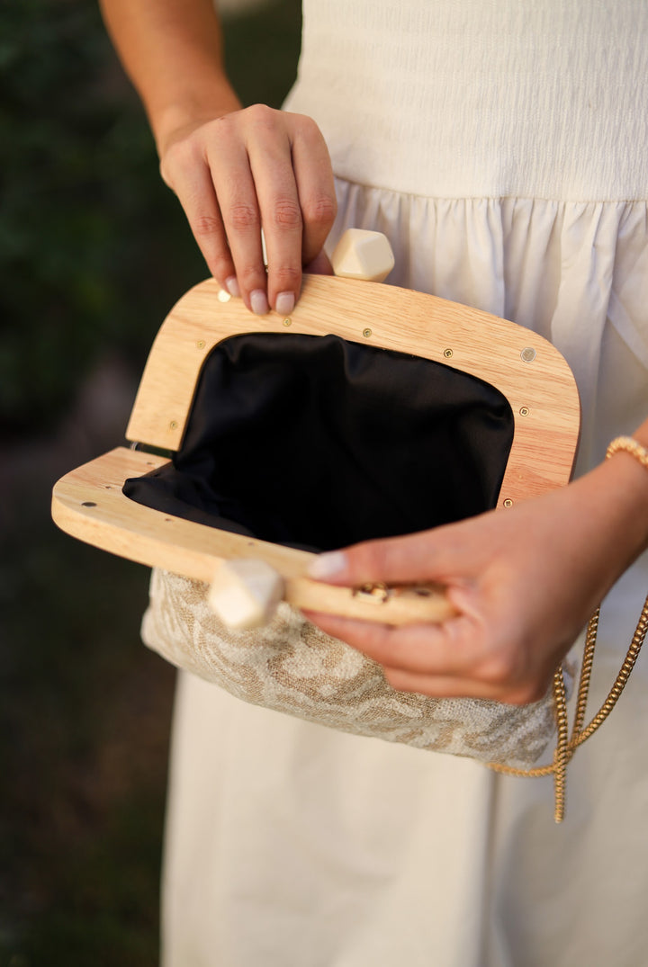 Coral wooden frame clutch