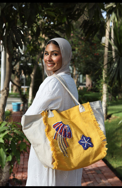 Yellow and white embroidered tote bag