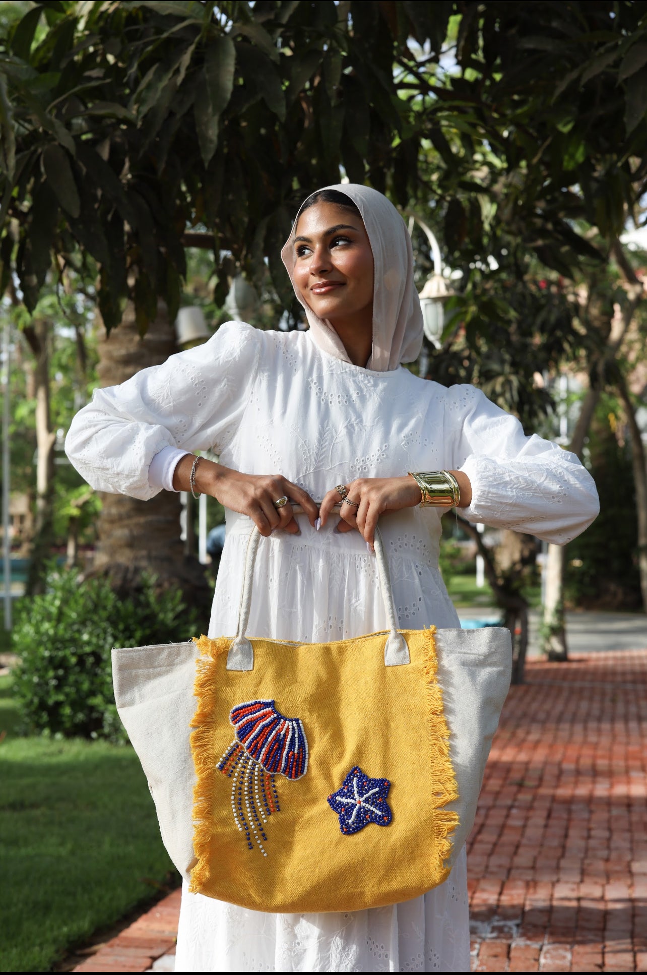 Yellow and white embroidered tote bag