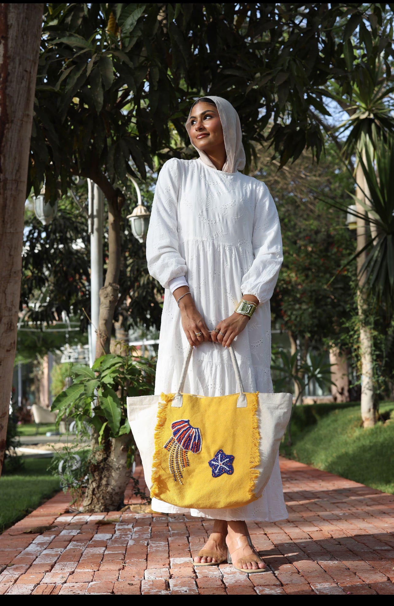 Yellow and white embroidered tote bag