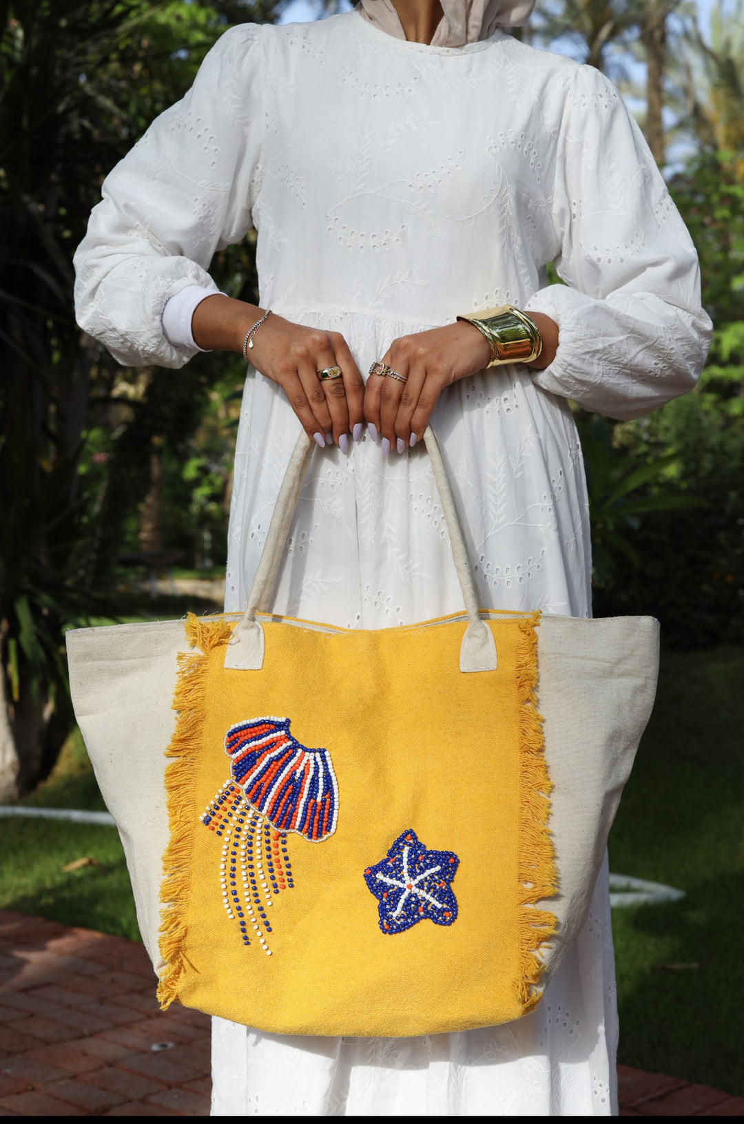 Yellow and white embroidered tote bag