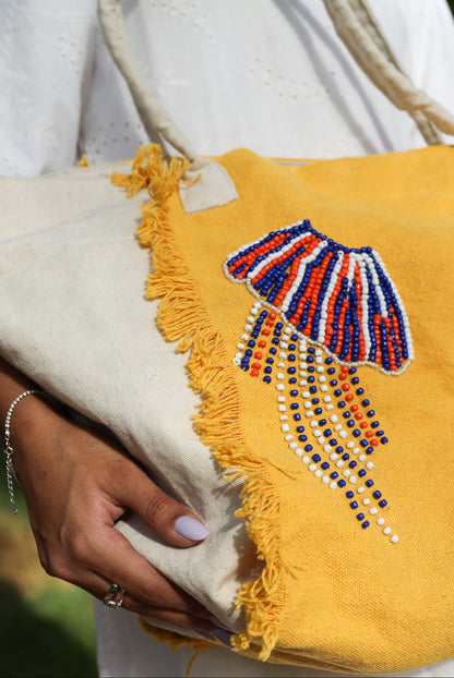 Yellow and white embroidered tote bag