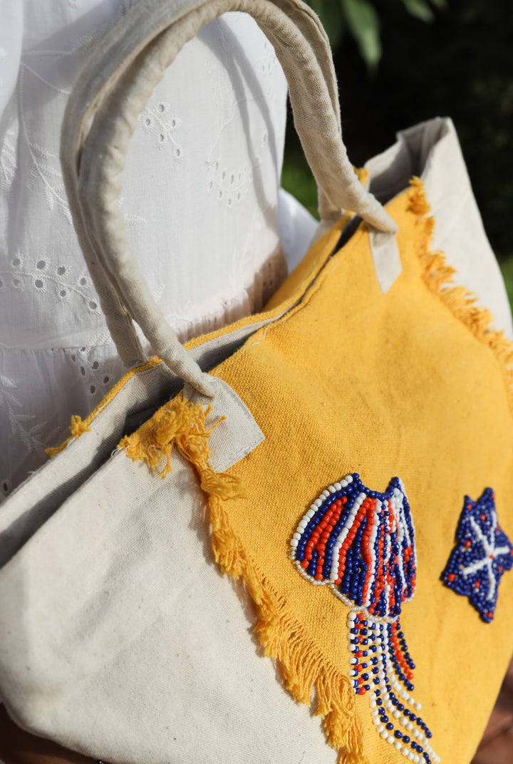 Yellow and white embroidered tote bag