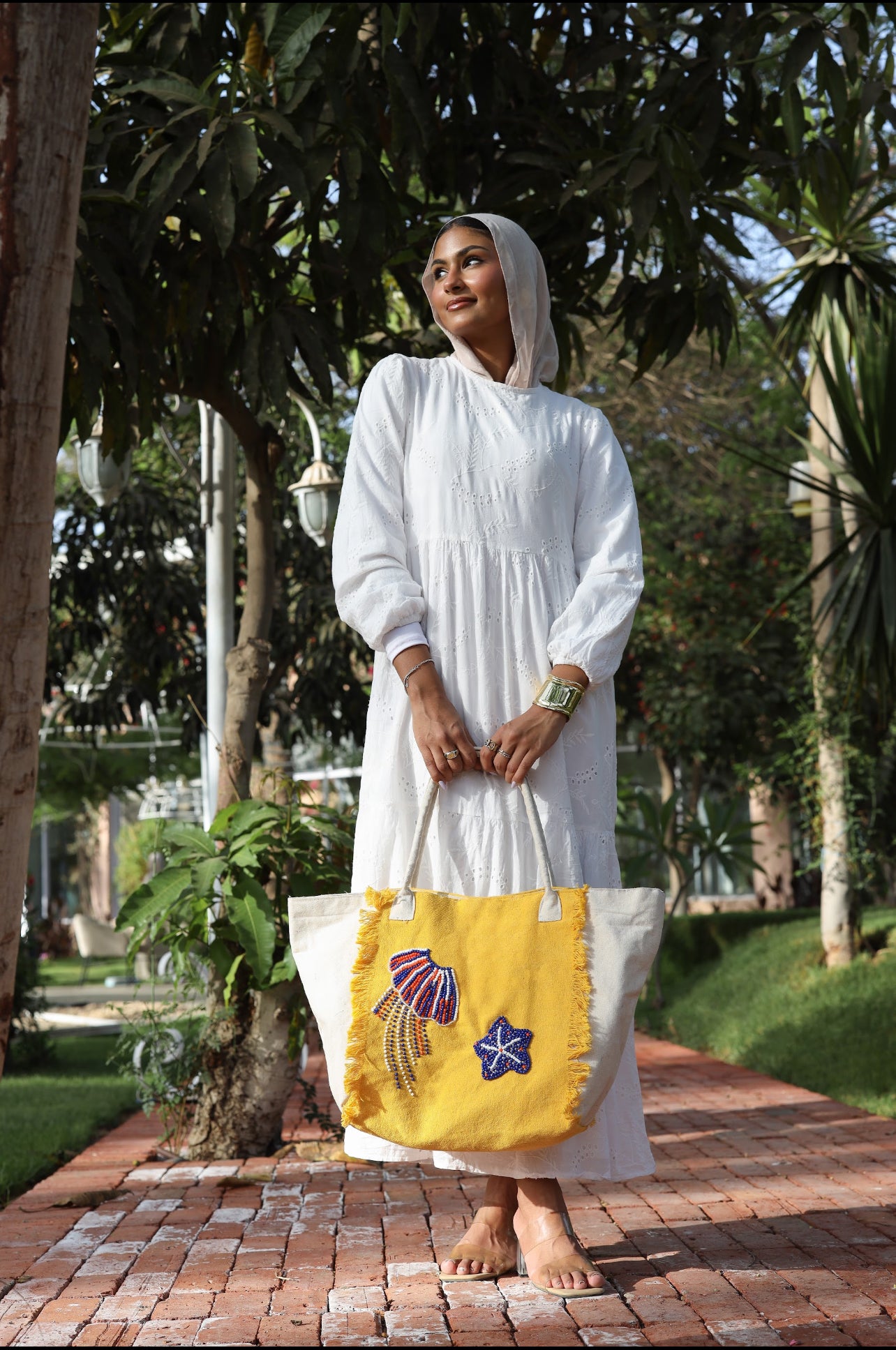 Yellow and white embroidered tote bag