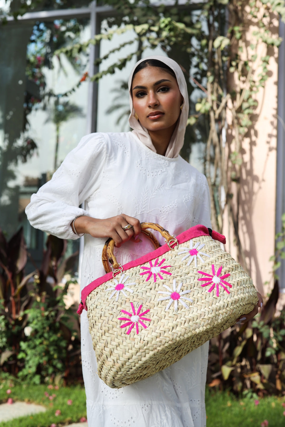 Fuschia embroidered wicker bag