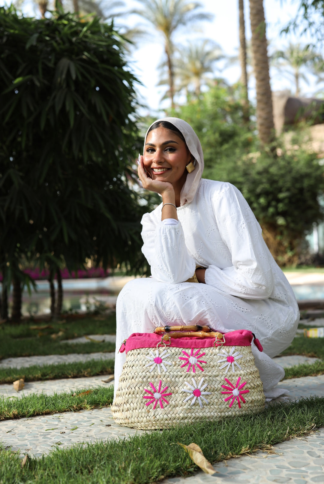 Fuschia embroidered wicker bag