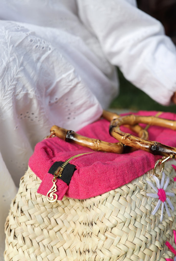 Fuschia embroidered wicker bag