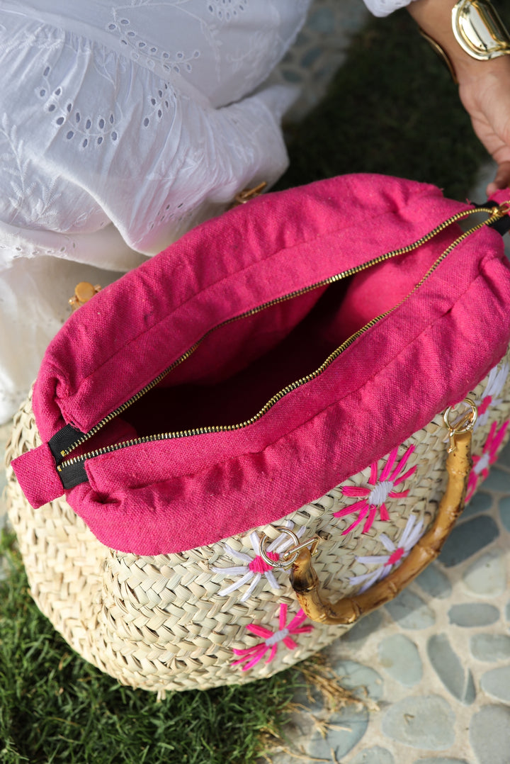 Fuschia embroidered wicker bag