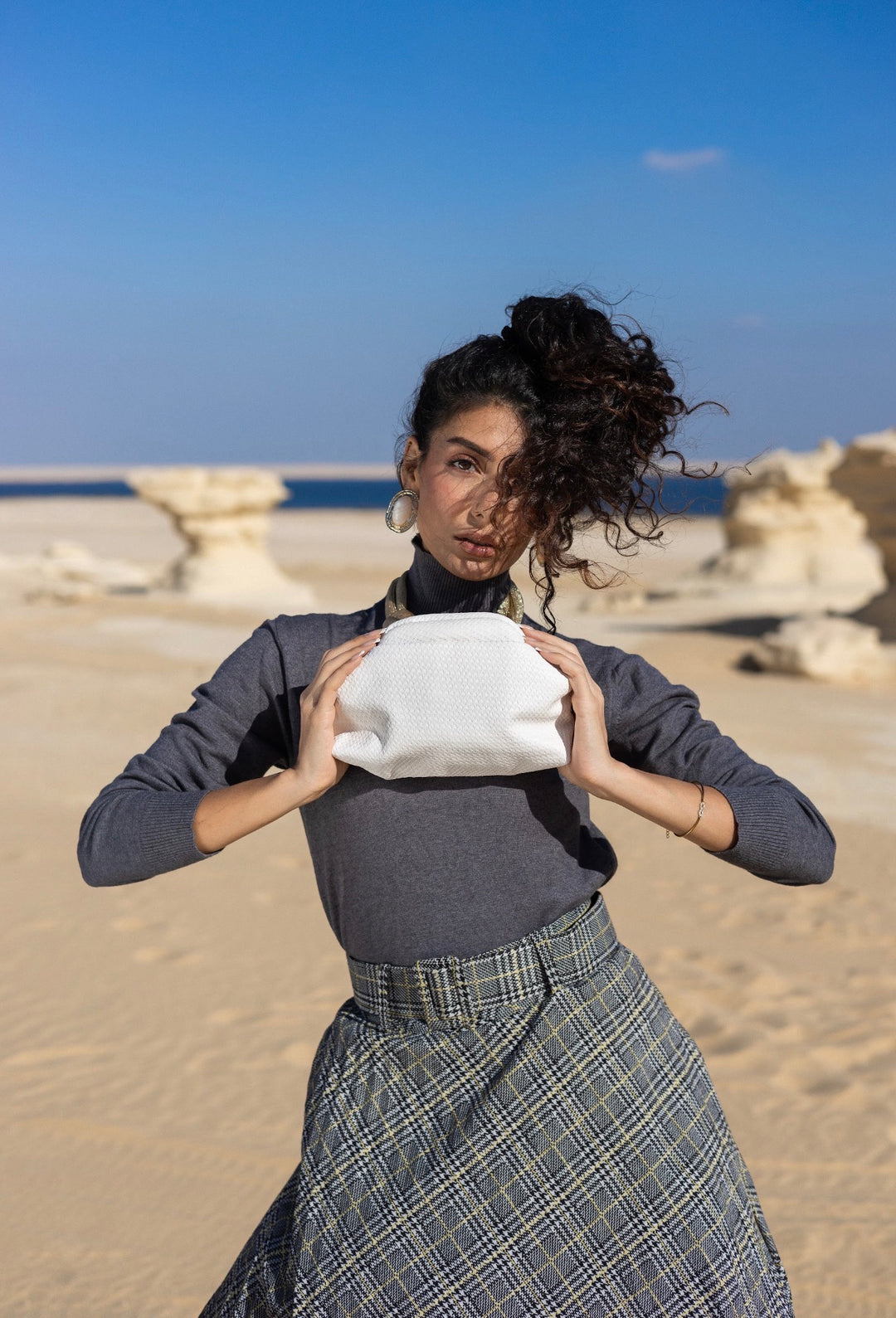 White leather clutch