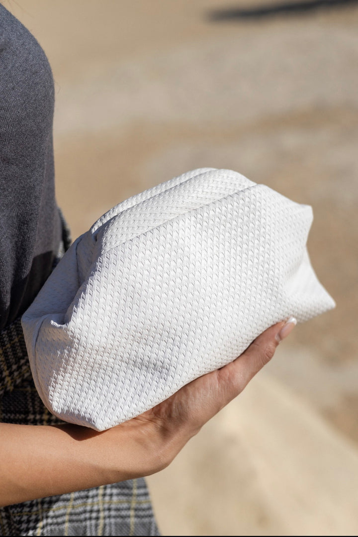 White leather clutch