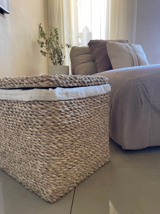 A Basket Made of Braided Wicker and Cover with Wicker